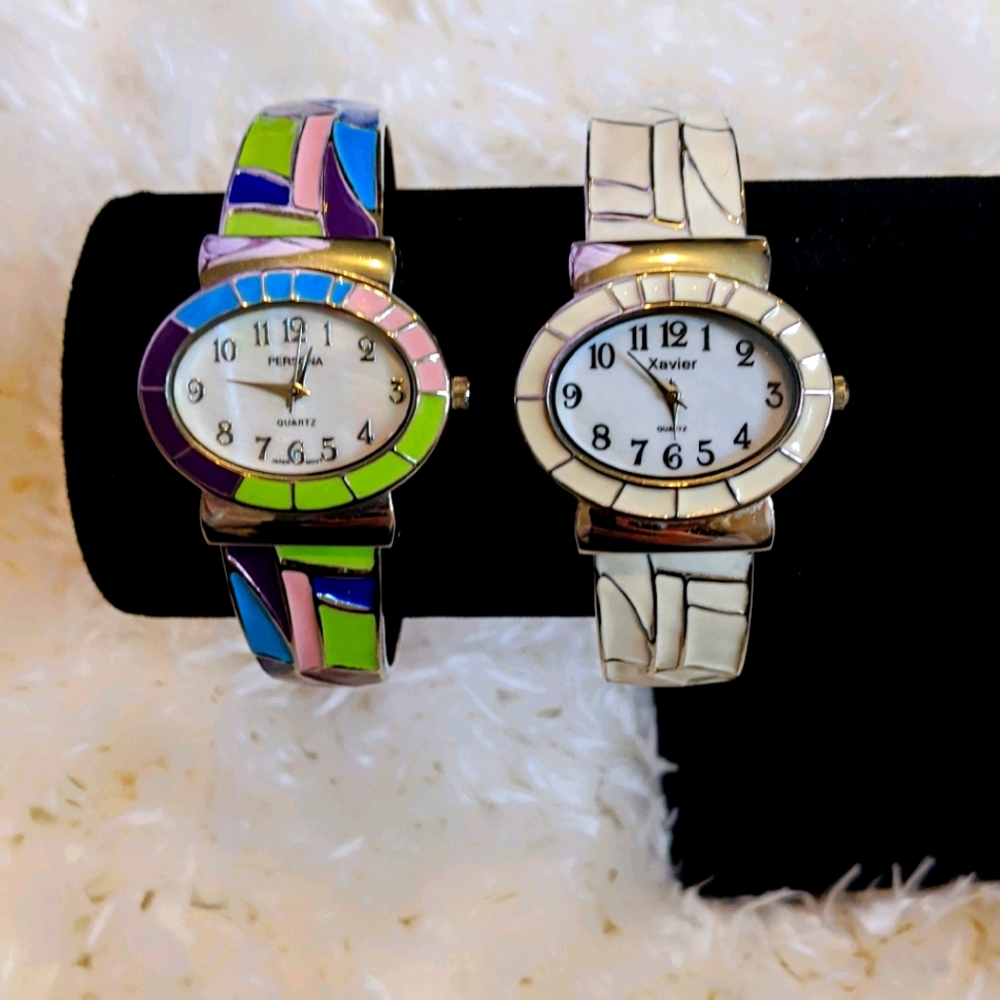 Two bangle cuff watches